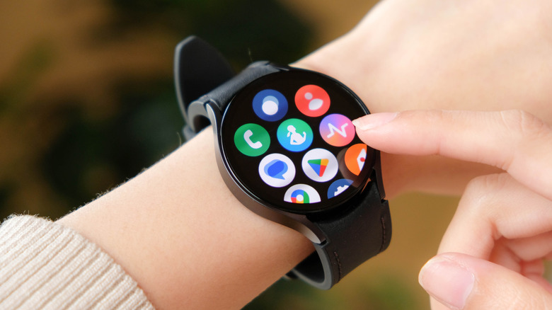 Samsung Galaxy Watch 6 on persons wrist showing applications