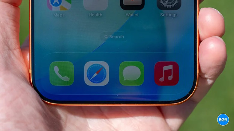 Close up of a hand holding an iPhone 17 Pro showing the bottom menu