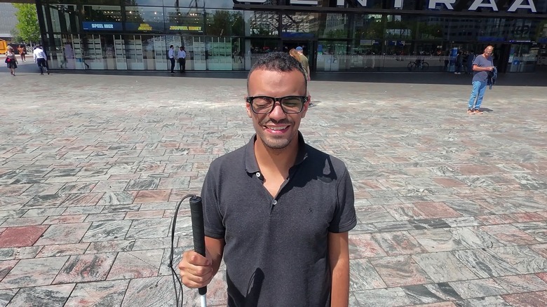 A low-vision person using the Ally Solos Glasses.