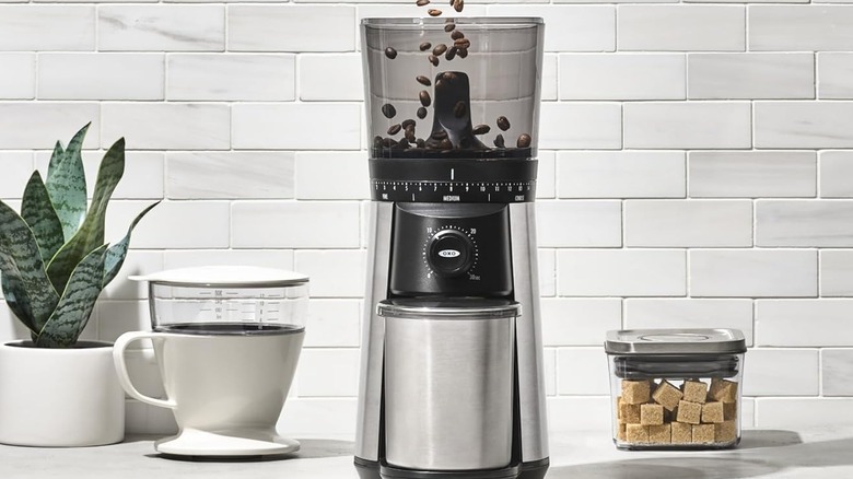 The OXO Brew Conical Burr Grinder placed on a kitchen counter.