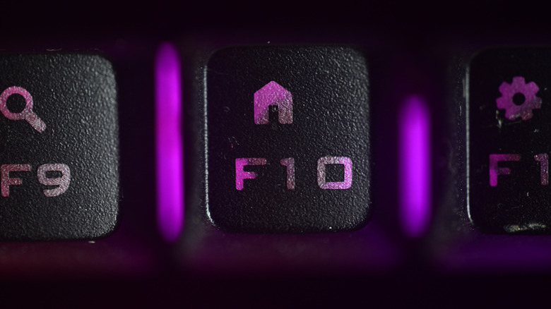 Close-up of the F10 key on a backlit keyboard