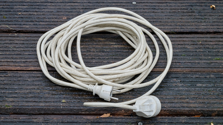 An old, weathered extension cord.