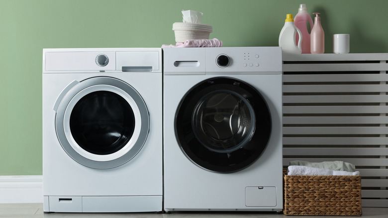 A washer and dryer in a laundry room.