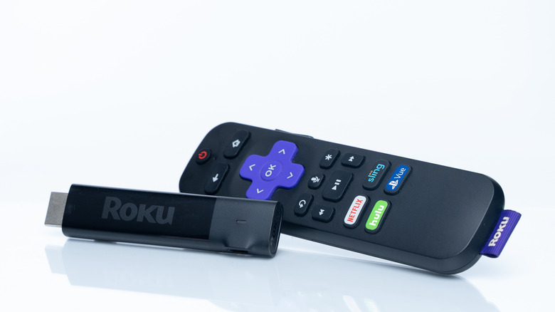 A Roku Stick with a remote