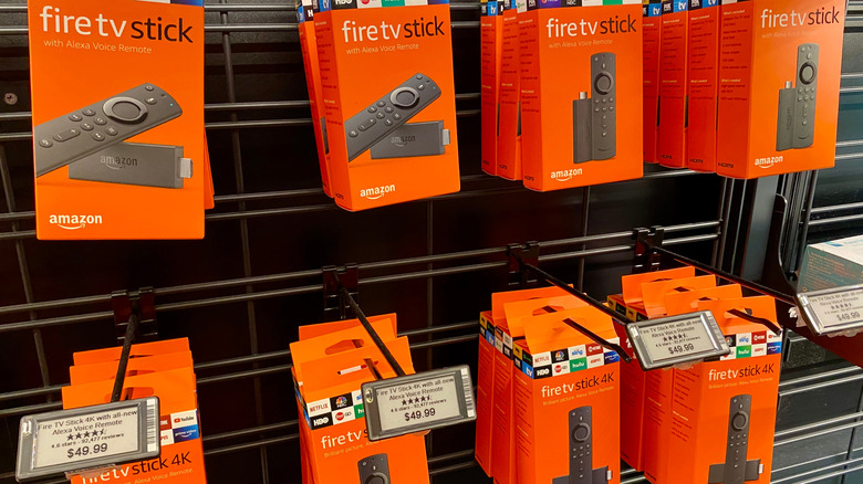 Fire TV Stick models on display in a store