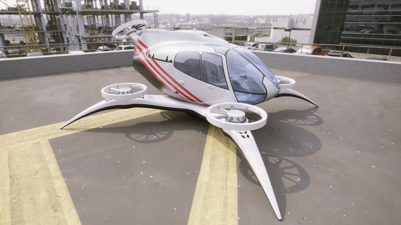 An electric aircraft parked on a roof