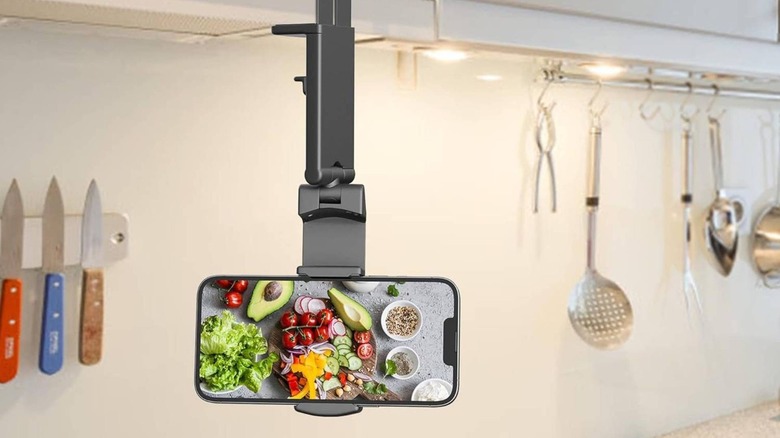 close-up of Periliogics phone mount holder in use in a kitchen environment