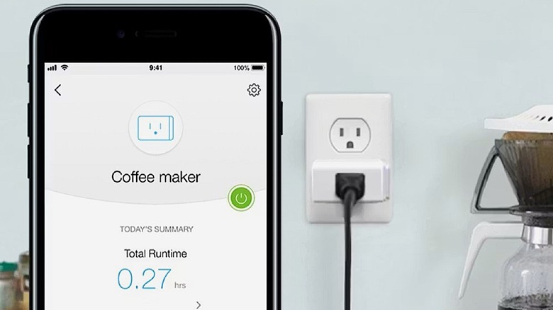 Kasa smart plug mini plugged into coffee maker with app visible