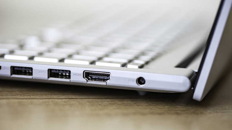 Closeup of USB ports on the side of a laptop