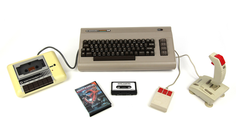 The Commodore 64 with accessories such as the cassette player and joystick.