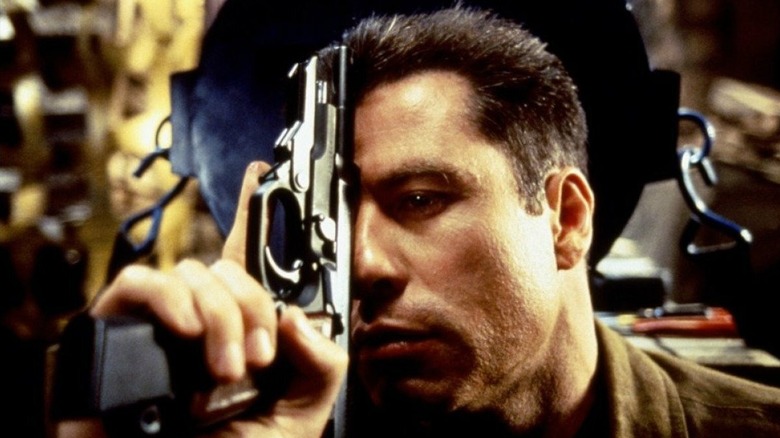 John Travolta as Major Vic Deakins in Brown Arrow