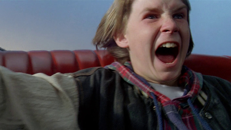 Danny screaming during a wild car chase