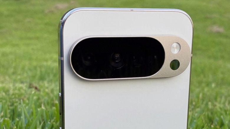 back of google pixel phone in a grassy environment