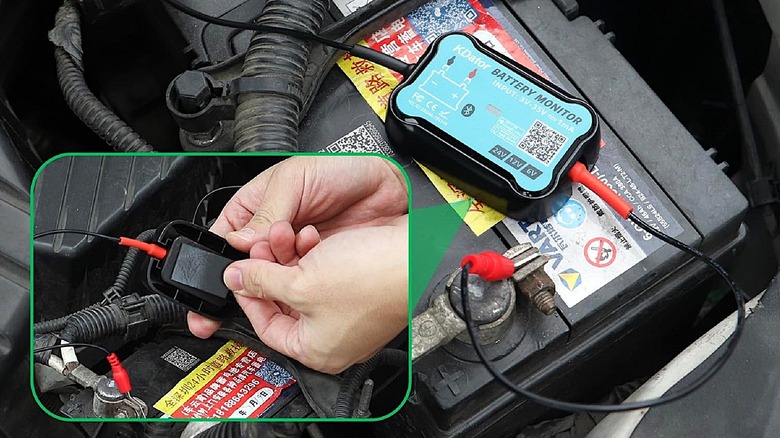 KDator Bluetooth Battery Monitor being installed inside a vehicle