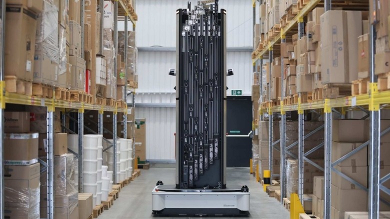A Dexory tower robot in a warehouse