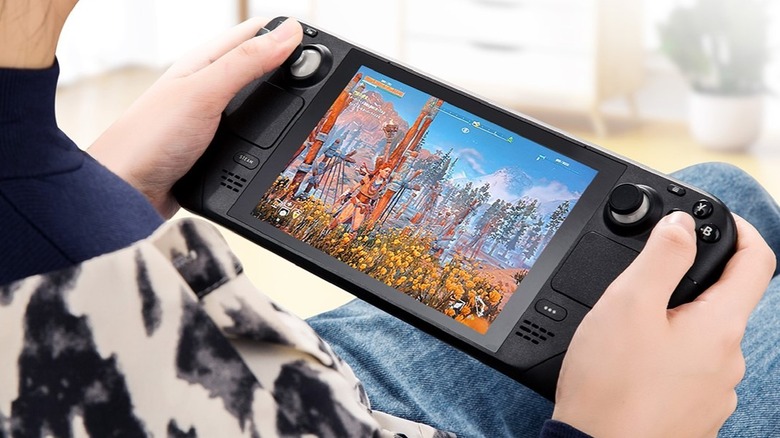 Gulikit Hall Effect joysticks for Steam Deck close up with someone playing.