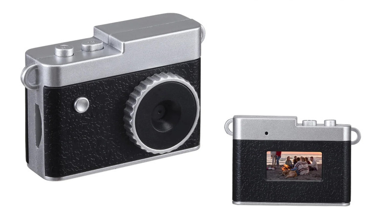 View of the front and back of the Vivitar digital keychain camera.