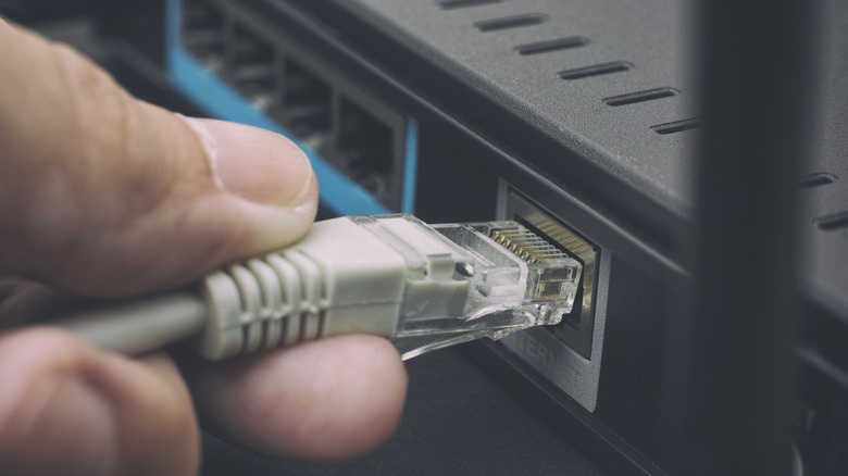 Connecting an Ethernet cable into a router