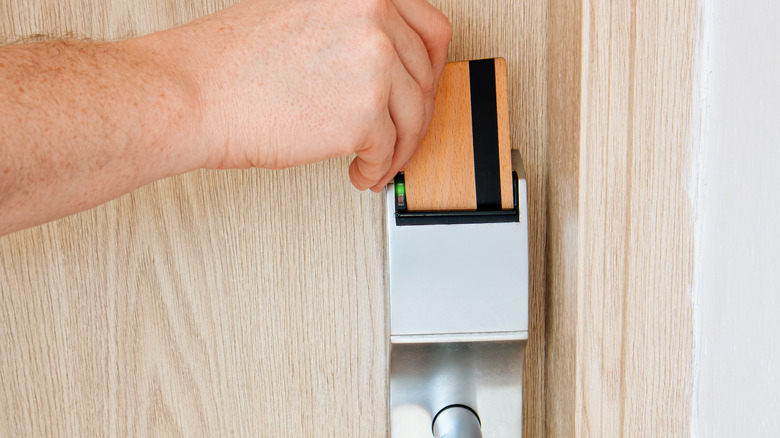 Unlocking a door with a magnetic keycard.