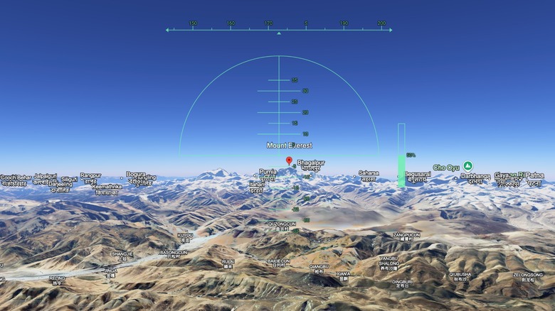 A screenshot of Google's Flight simulator within Google Earth, the image depicts a first-person perspective of a plane flying over Mount Everest