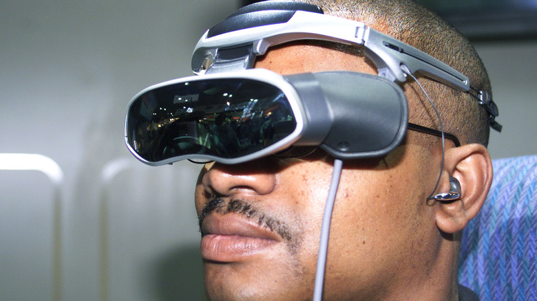 A man wearing the Sony Glasstron PLM-A35 Personal Viewer