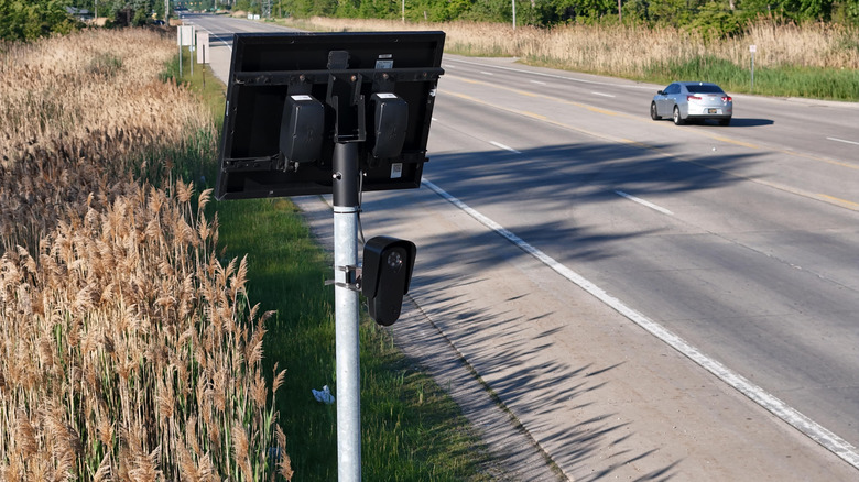 Top down view of Flock surveillance ALPR used to track vehicle license plates.