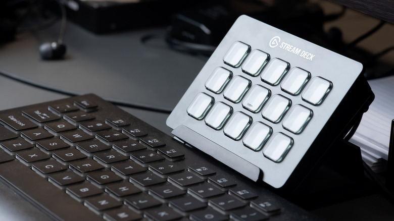 Elgato Stream Deck macro pad on desk next to keyboard.