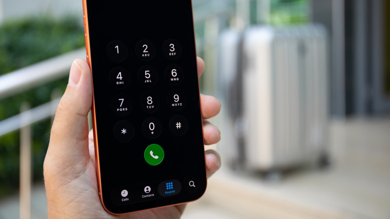 The Phone app open on an iPhone 17 Pro Max with the keypad in view.