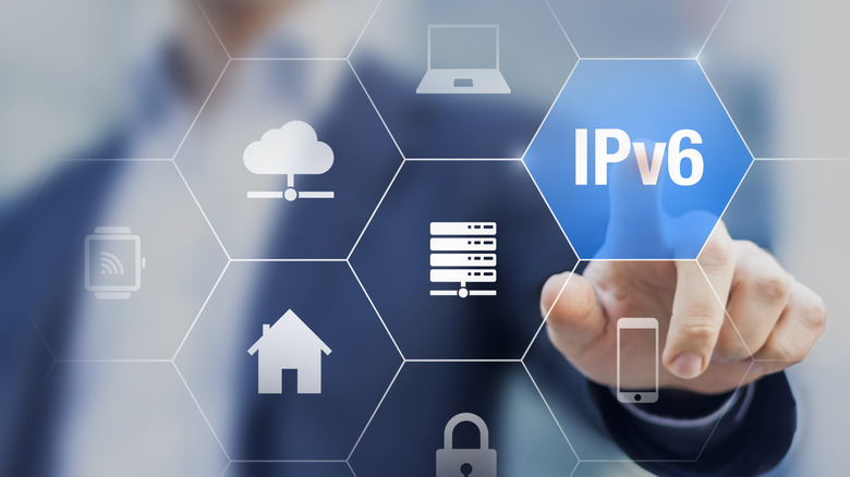 An image of a hand touching an IPv6 icon on a holographic interface