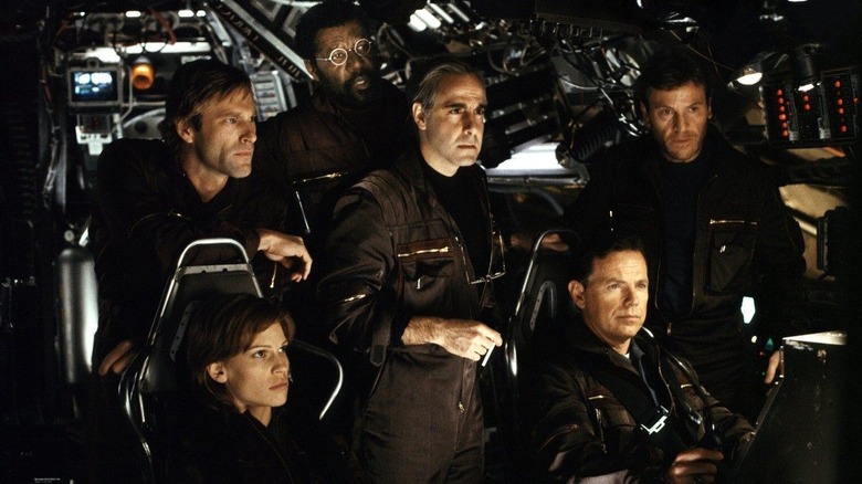 The scientist team together in the ship