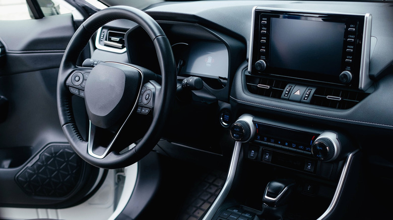 Closeup of a car's interior and dashboard