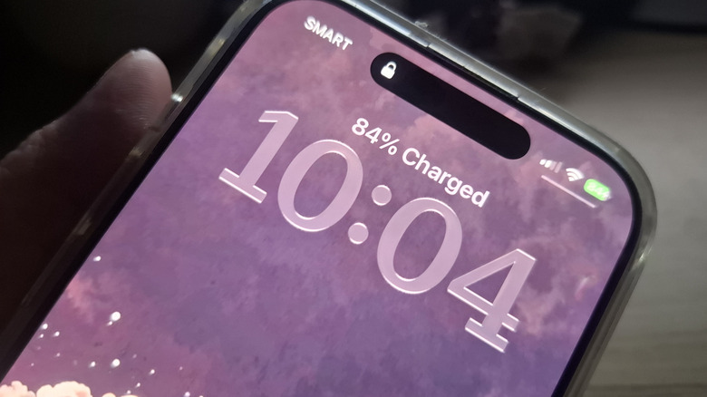 The iPhone Lock Screen showing the charge-time estimate