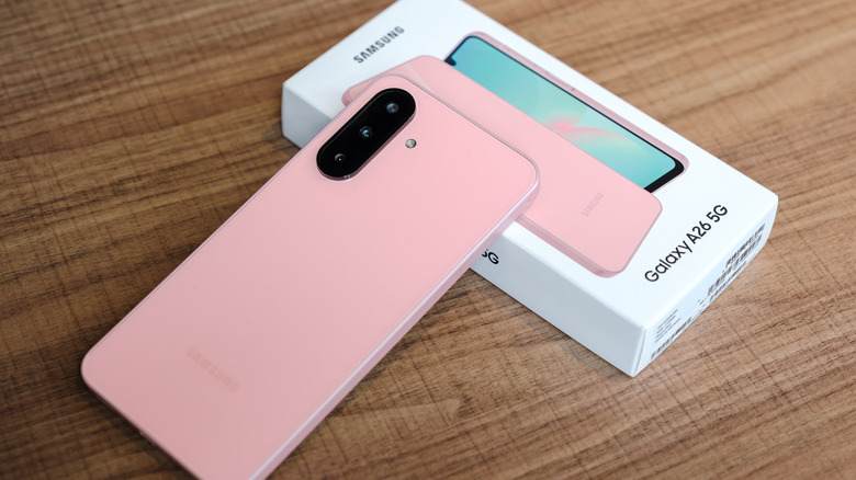 The Samsung Galaxy A26 5G phone alongside its original packaging