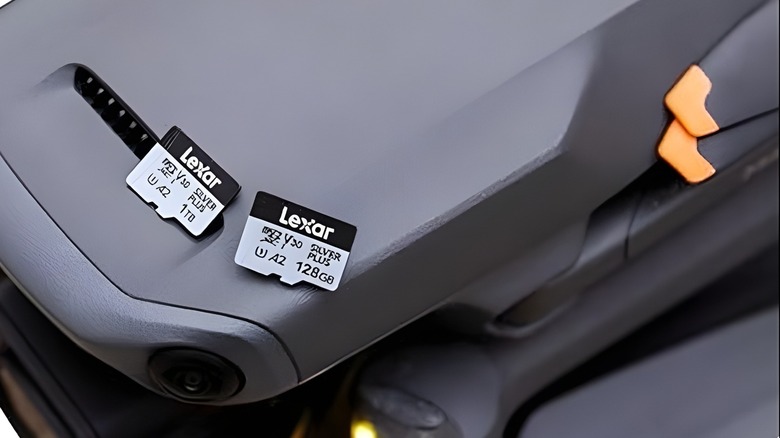 Lexar Silver Plus 1TB and 128GB MicroSD cards on top of a DJI drone.
