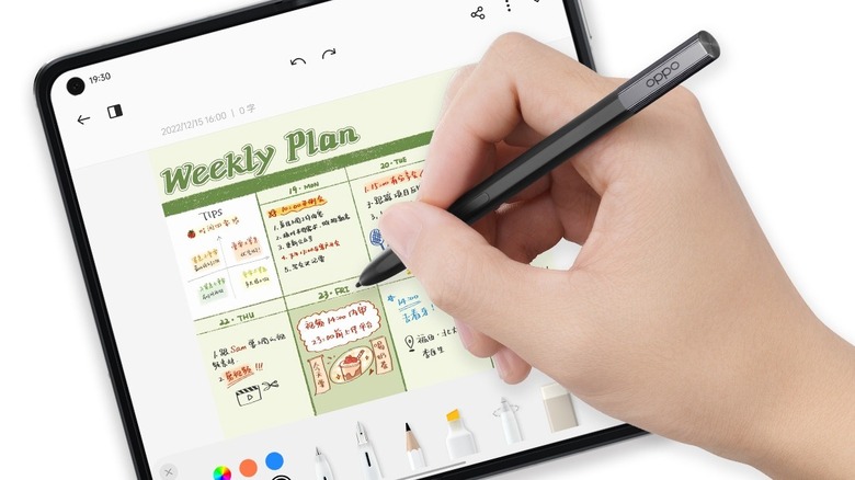 Close-up of a person using the Oppo Pen on a Oppo foldable phone