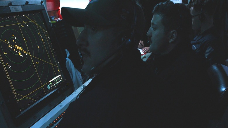 Operators guide aircraft during flight quarters in the Carrier Air Traffic Control Center on board the USS Gerald R. Ford.