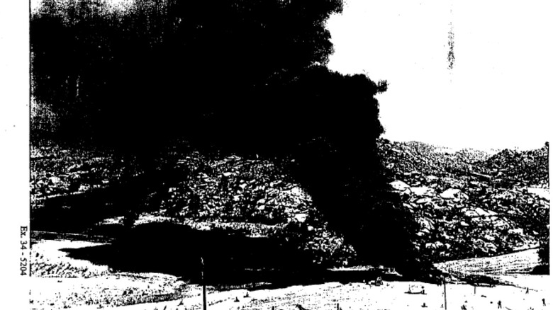 Black smoke billows from a burn pit at the Santa Susana lab.