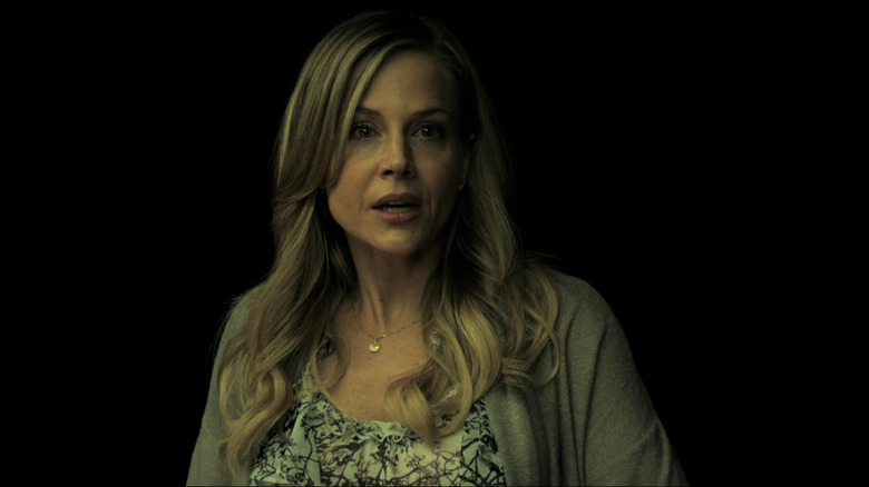Julie Benz looking scared
