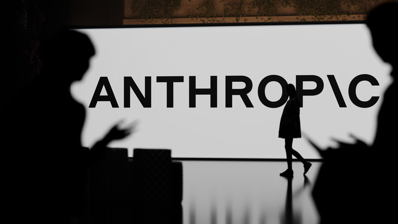 Anthropic logo in a backdrop to a media event.