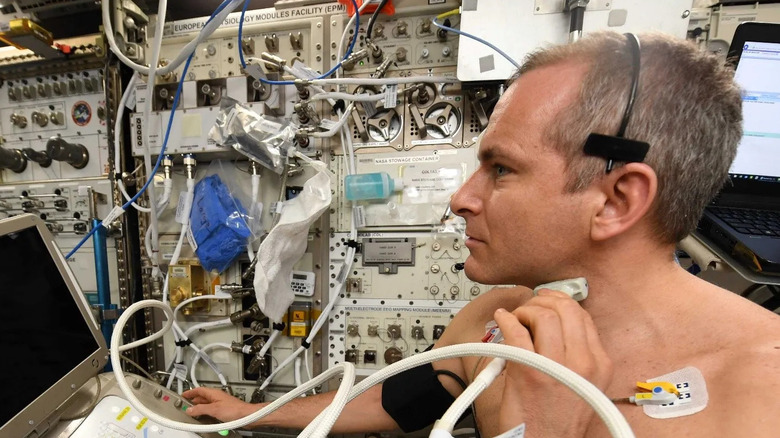 Astronaut David Saint-Jacques conducting vascular ultrasound