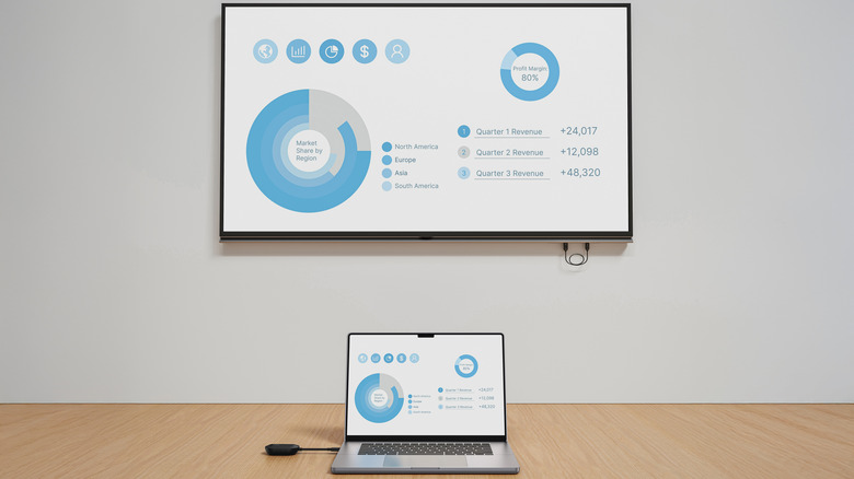 Belkin's wireless HDMI dongle connecting a laptop to a TV