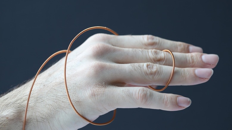 Close-up of FiberMotor wrapped around a human hand