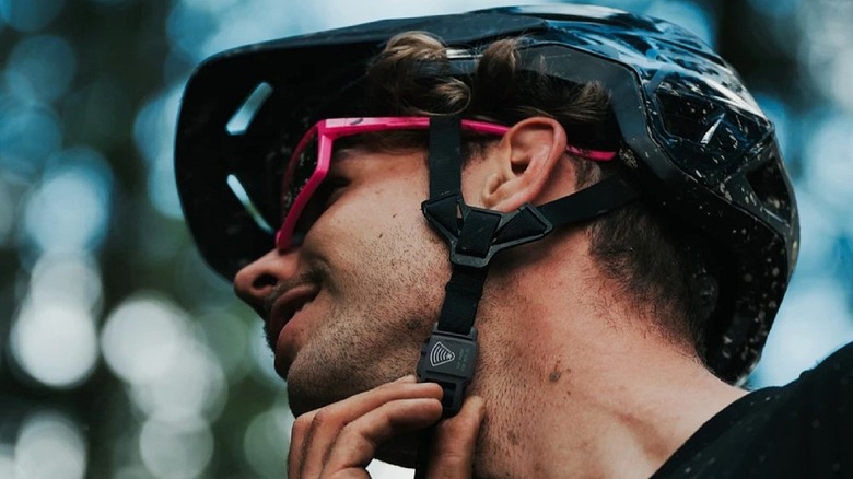 Fidlock Snap Buckle smart NFC device for sports helmets while worn.