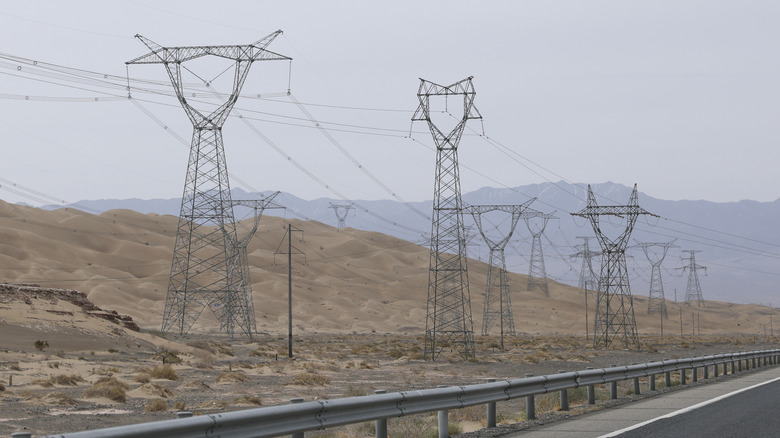 Electrical power cables alongside a highway in China