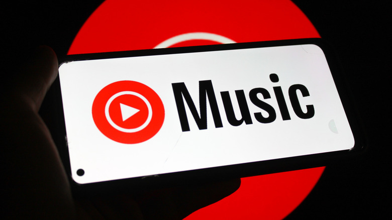 YouTube Music logo on smartphone