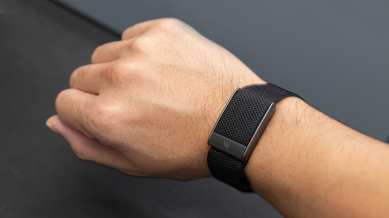 A whoop band shown on a person's wrist