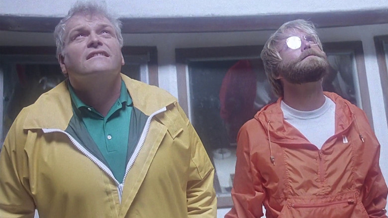 Walter and Pillsbury looking upwards at something bright