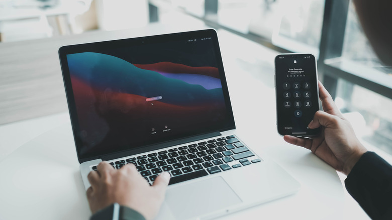 MacBook and iPhone with the screens locked.