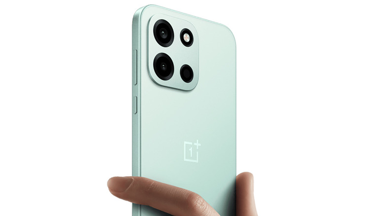 A hand holding the OnePlus Nord 6