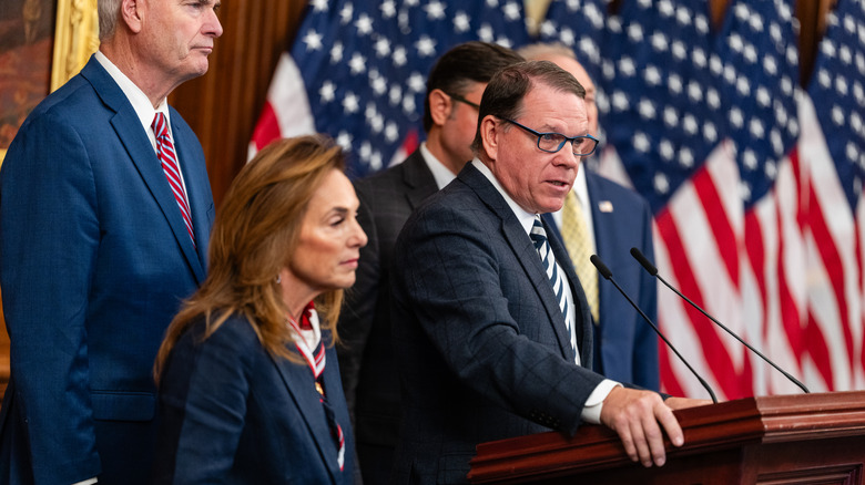 Congressman Sam Graves stands at a podium besides several GOP politicians during a press conference discussing air traffic controller pay during the 2025 government shutdown.